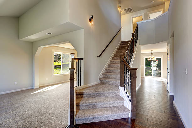 istock Beautiful entry way with carpet staircase. 482881416