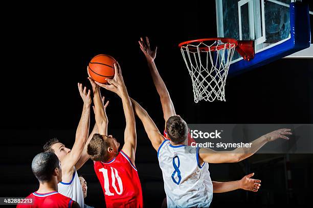 Basketball Players In Action Stock Photo - Download Image Now - Basketball - Ball, Basketball - Sport, Basketball Player