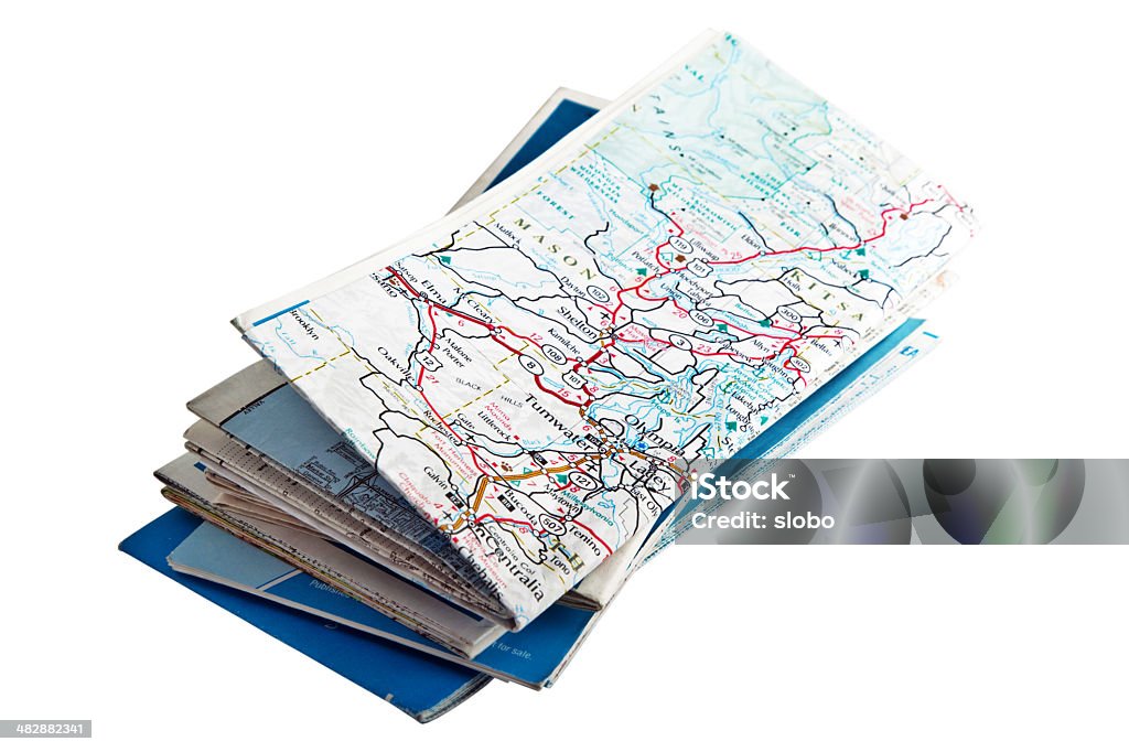 Folded Road Maps Folded road  maps isolated on white. Map Stock Photo