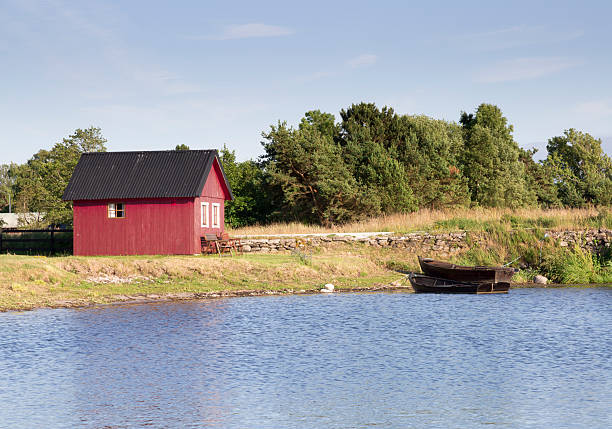 istock Red House by Rowing Boats 482882348
