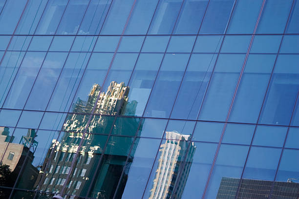 istock Manhattan in reflections: modern USA architecture; glasse's skyscrappers 482882535