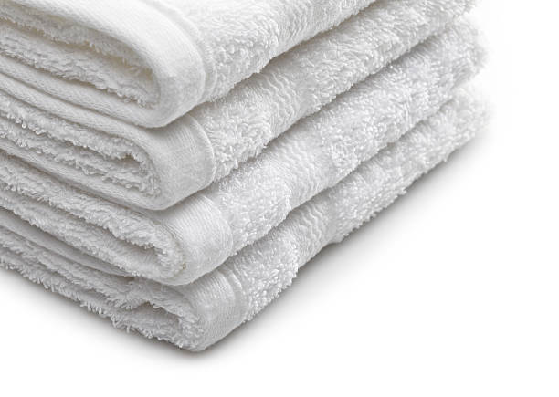 istock Stack of white hotel towels on a white background 482882617