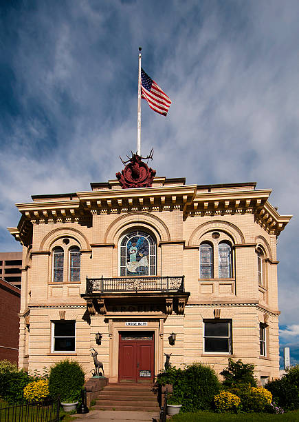 Hartford Elks Lodge Hartford, Connecticut USA - August 4, 2013: The Benevolent and Protective Order of Elks Lodge #19 is an historic building listed in the National Register of Historic Places. It was the first building constructed deliberately to house an Elks club. The building is symmetrical and the facade features yellow brick. It was completed in 1903. american hartford gold group complaints stock pictures, royalty-free photos & images
