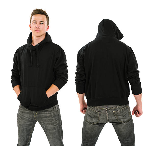 Male with blank black hoodie Photo of a male in his late teens posing with a blank black hoodie.  Front and back views ready for your artwork or designs. hooded shirt stock pictures, royalty-free photos & images