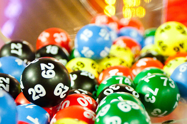Tumbling lottery balls stock photo