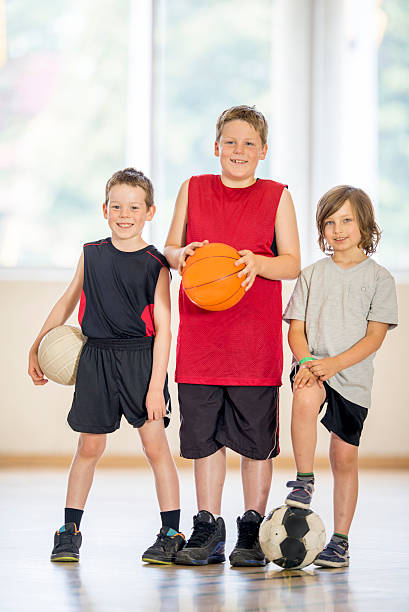 istock Young Boys Playing Sports 482886974