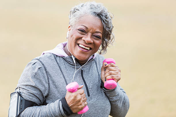 istock Senior African American woman exercising 482887030
