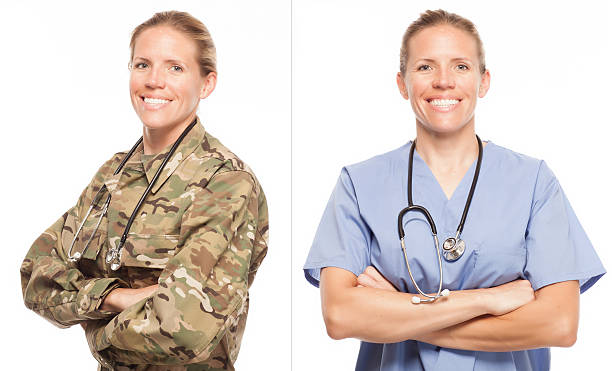 Military to Civilian Transition. Veteran Soldier Army doctor or nurse in uniform on white background.  Military to civilian transition showing woman in scrubs. civilian stock pictures, royalty-free photos & images