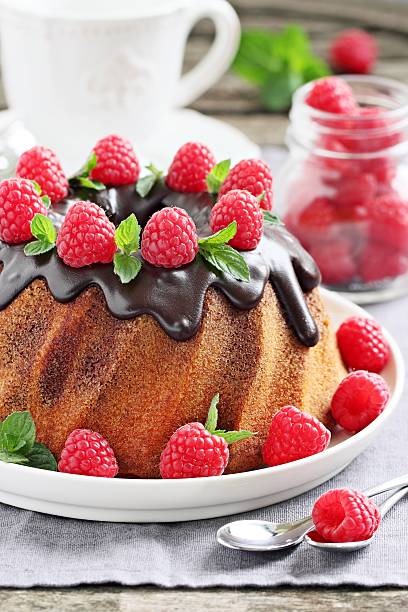 istock Vanilla-chocolate cake with fresh raspberries 482897054