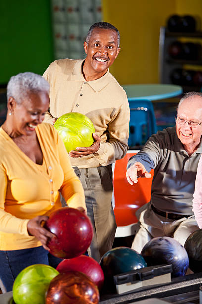 istock Seniors at bowling alley 482899703