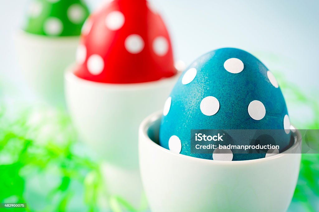 Easter eggs Dotted Eastern eggs,selective focus on the front blue egg. Animal Egg Stock Photo