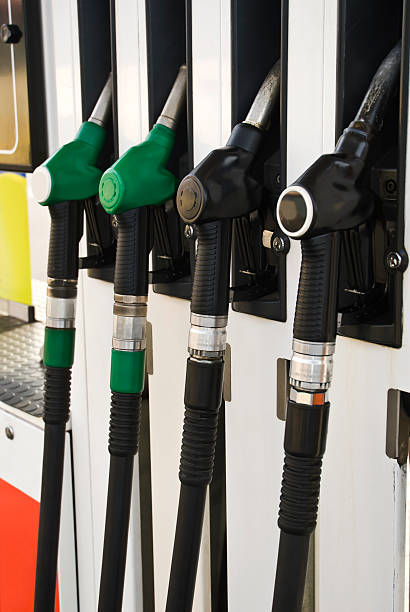 istock Pump nozzles at the gas station (selective focus) 482901085