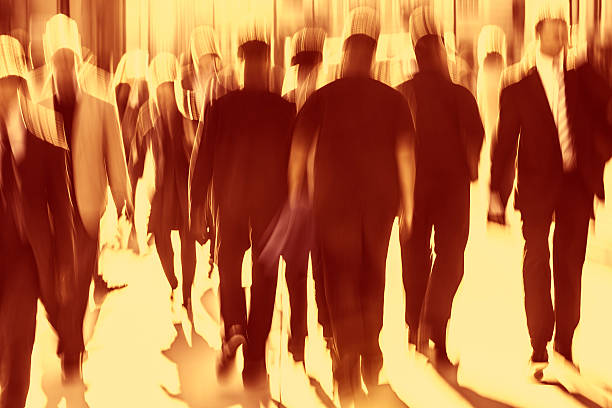 istock Crowd of People Walking in Sunlight, Blurred Motion, London, England 482901243