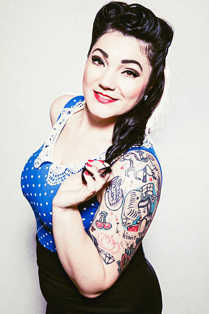 50's style Portrait series of pin up girl in vintage clothes. black pin up girl tattoos stock pictures, royalty-free photos & images