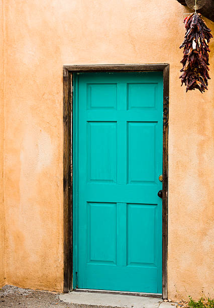 istock Distinctive blue door with hanging red peppers in Old Town 482904886