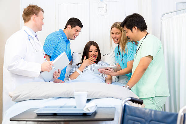 istock Healthcare:  Patient views exciting results on digital tablet. 482905651