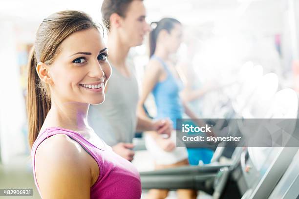 Young People Exercising In Gym Stock Photo - Download Image Now - Activity, Adult, Adults Only