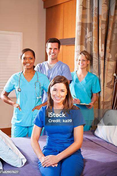 Foto de A Saúde Dos Trabalhadores No Hospital Quarto e mais fotos de stock de Doutor - Doutor, Profissional de enfermagem, Sorrindo