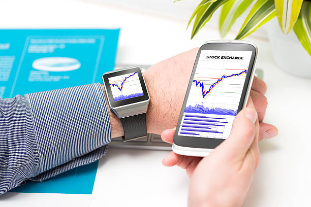 istock Businessman uses smart watch and phone. 482908360