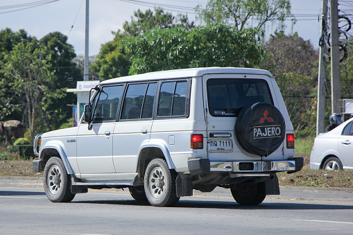 Chiangmai, Thailand - January  11, 2015:  Old Private Mitsubishi Pajero Truck. Photo at road no.1001 about 8 km from downtown Chiangmai, thailand.