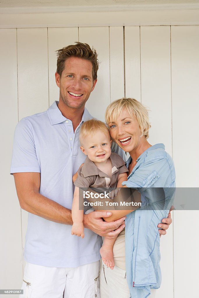 Man and woman with baby  Child Stock Photo
