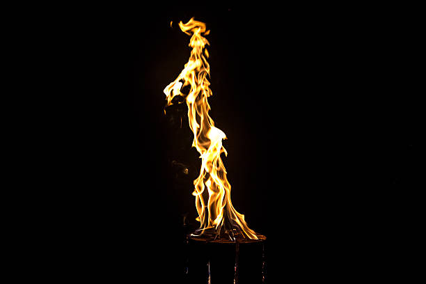 istock Image of bright yellow flame by night 482914968