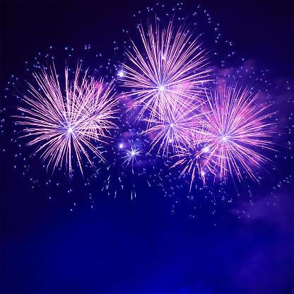 Blue colorful fireworks on the black sky background