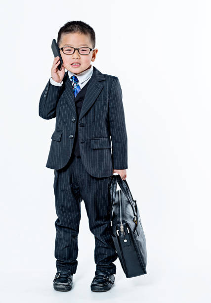 garotinho falando no telefone - telephone child isolated on white elegance - fotografias e filmes do acervo