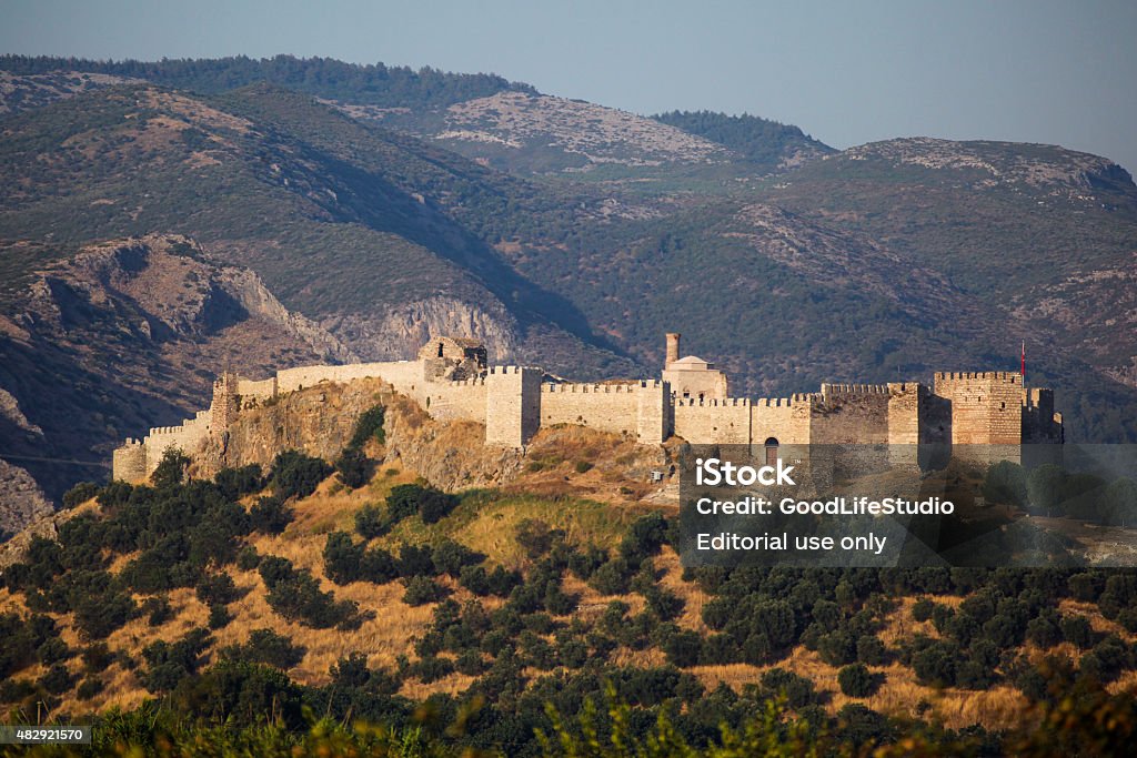 Selcuk Castle Selcuk, Turkey - July 21, 2015: Well-preserved fortress on the hill above the town of Selcuk. The original Greek name of this place was Agios Theologos. In the XIV century it was the capital of Aydin Emirate. Under the Ottoman Empire it was known as Ayasoluk but was renamed in 1914 after Seljuk Turks. Selcuk Stock Photo