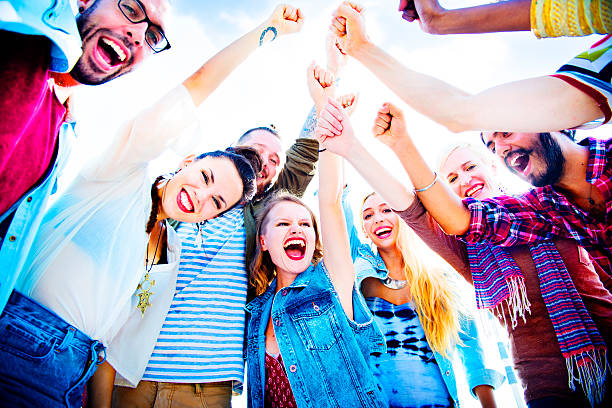 istock Friends Huddle Join Holiday Party Group Concept 482924902