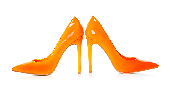 Classic stiletto High Heels pump shoes in orange patent leather, isolated on white, See related images: