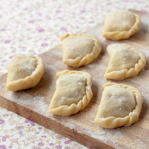 istock Uncooked dumplings with potatoes and mushrooms 482926783