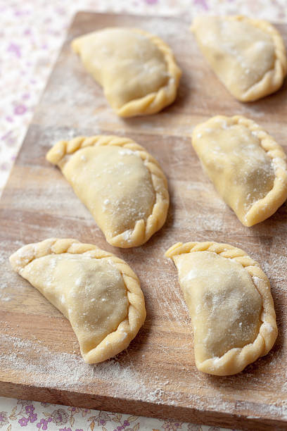 istock Uncooked dumplings with potatoes and mushrooms 482926793