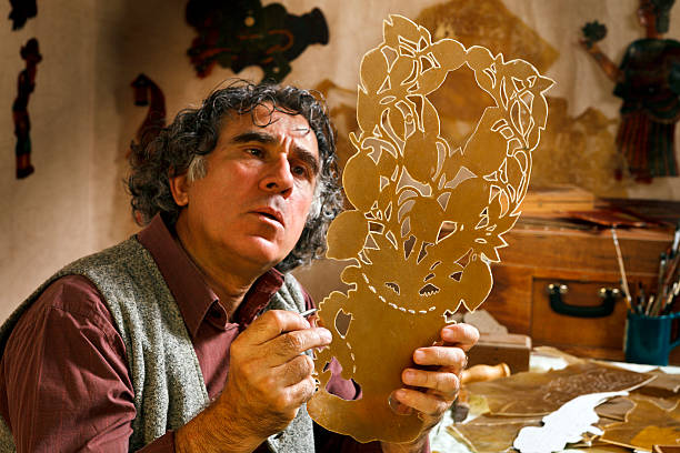 Puppet maker's studio Master of the Turkish Shadow Puppet Tradition, Karagoz and Hacivat. hacivat karagoz stock pictures, royalty-free photos & images