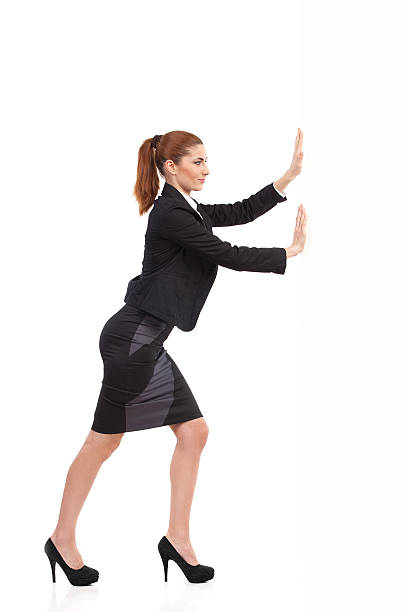 istock Businesswoman pushing the wall 482928023