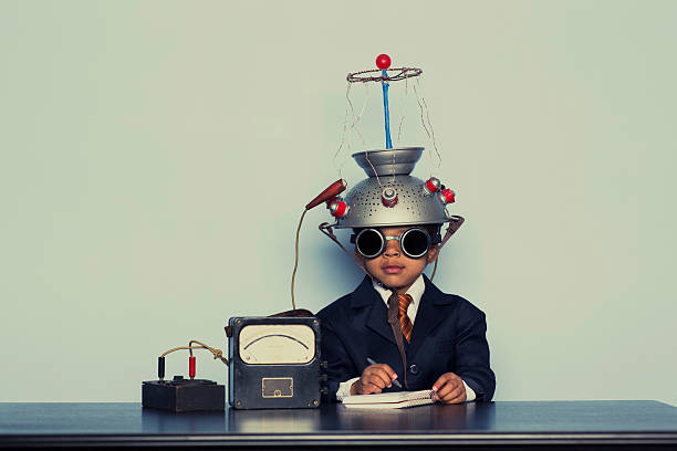 istock Young Business Boy with Mind Reading Helmet 482929127