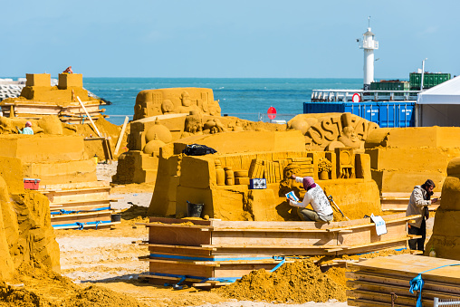 Ostend, Belgium - May 27, 2015: Sand Sculpture Festival «Frozen Summer Fun» 2015 at Ostend Beach, Belgium preparing