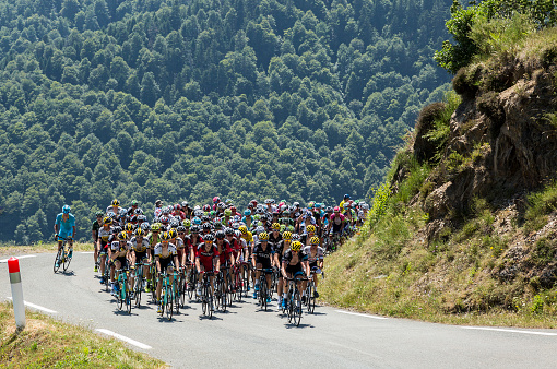 Col D'Aspin,France- July 15,2015: The peloton climbing the road to Col D'Aspin  in Pyrenees Mountains during the stage 11 of Le Tour de France 2015.