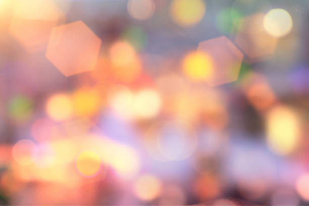 istock Defocused cityscape background with yellow bokeh lights 482940378