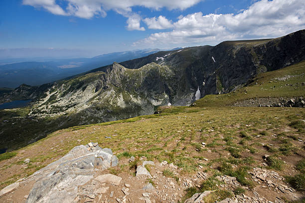 istock Green landscape with clouds, Rila Mountain 482947404