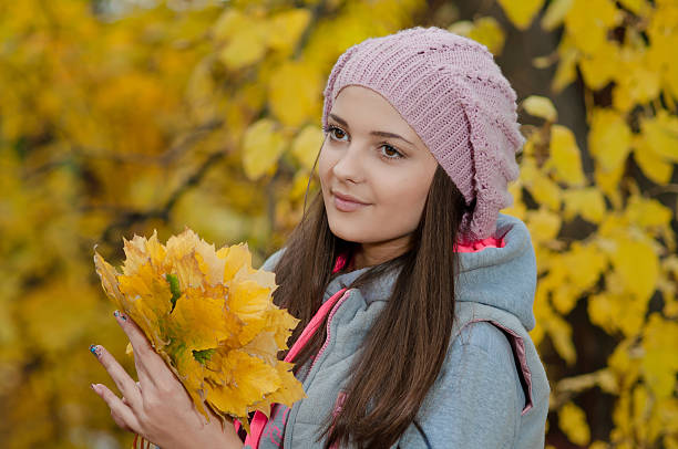 istock Young girl in a park in autumn 482949663