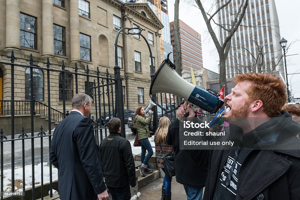 NSGEU Strike at Province House Halifax, Canada - April 3, 2014: Nurses with the Nova Scotia Government & General Employees Union strike outside Province House after walking out on a legal strike when talks with the union and Capital Health reached a stalemate in contract talks primarily relating to the union's demands for lower nurse-to-patient ratios. Labor Union Stock Photo