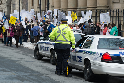 Halifax, Canada - April 3, 2014: Nurses with the Nova Scotia Government & General Employees Union strike outside Province House after walking out on a legal strike when talks with the union and Capital Health reached a stalemate in contract talks primarily relating to the union's demands for lower nurse-to-patient ratios.