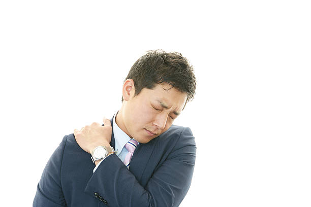 istock Businessman with shoulder pain. 482953803