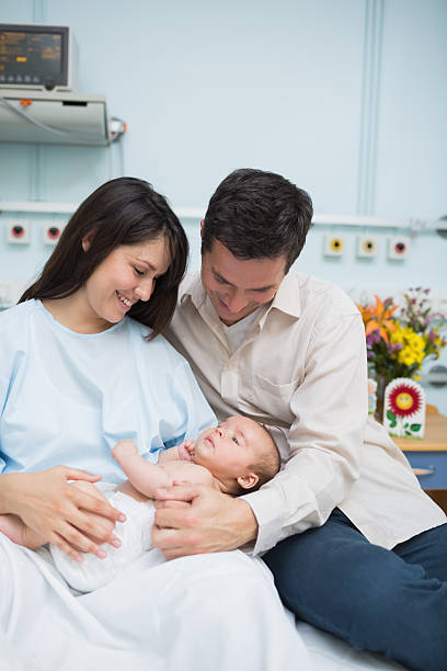 istock Father and mother with a baby 482954575