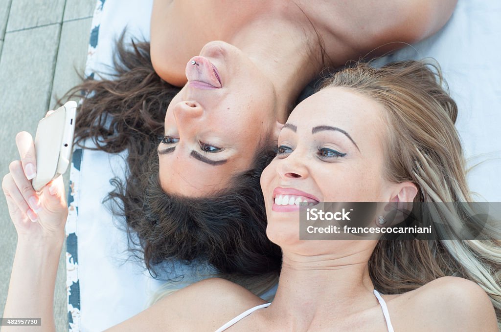 beautiful girl on the phone selfie of two beautiful girl 2015 Stock Photo