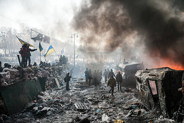 KIEV, UKRAINE - January 25, 2014: Mass anti-government protests Kiev, Ukraine - January 25, 2014: Mass anti-government protests in the center of Kiev. Barricades in the conflict zone on Hrushevskoho St. kyiv stock pictures, royalty-free photos & images