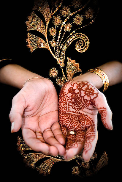 istock Beautiful henna tattoo in a bride's hand body art 482964697