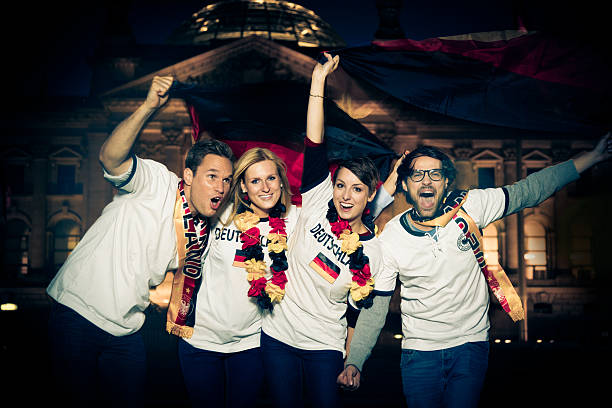 istock german soccer fans cheering for their team 482966193