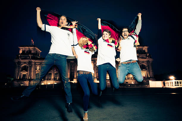 istock german soccer fans cheering for their team 482966213